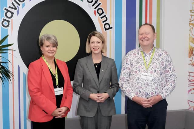 Education Secretary Jenny Gilruth meets Advice Direct Scotland chief executive Andrew Bartlett and deputy chief Executive Pamela Stewart at the launch of academy.scot