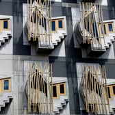 Windows on the Scottish Parliament building in Edinburgh. Greater Manchester mayor Andy Burnham has called for more co-operation between the north of England and Scotland. Picture: Getty Images