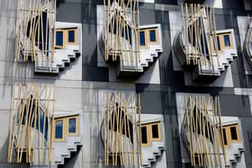 Windows on the Scottish Parliament building in Edinburgh. Greater Manchester mayor Andy Burnham has called for more co-operation between the north of England and Scotland. Picture: Getty Images