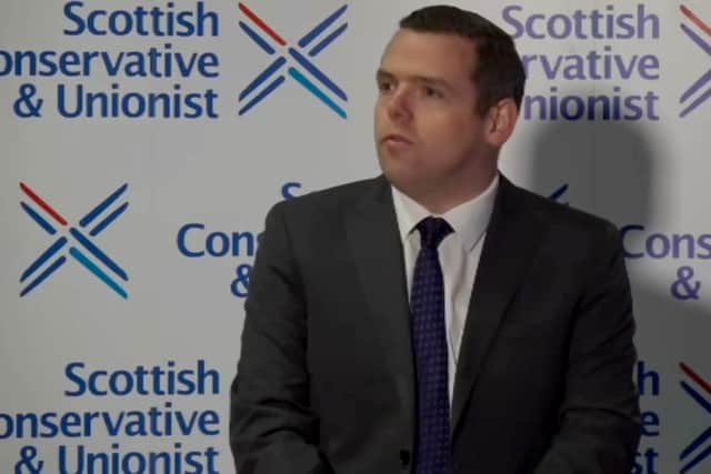 Scottish Conservative leader Douglas Ross during a press conference in Edinburgh, where he confirmed his intention to stand at the General Election despite initially planning to stand down.