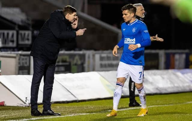 Rangers manager Steven Gerrard gives instructions to Ianis Hagi during the 2-0 win over St Mirren which saw the Romanian international provide another assist for his team. (Photo by Alan Harvey / SNS Group)