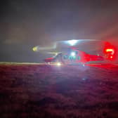 Coastguard helicopter arrives at Tinto Hill to assist with a rescue after a woman fell and suffered an injury picture: Moffat Mountain Rescue Team