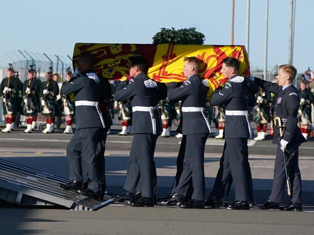 The coffin of Queen Elizabeth II at Edinburgh Airport from where it was flown by the RAF on its journey from Edinburgh to Buckingham Palace, London, to lie at rest.