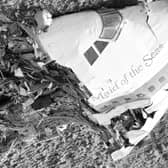 The nose section of the Pan Am Boeing 747 flight 103 airliner,lies in a field near Lockerbie after the bombing