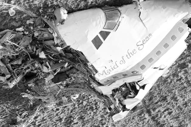 The nose section of the Pan Am Boeing 747 flight 103 airliner,lies in a field near Lockerbie after the bombing