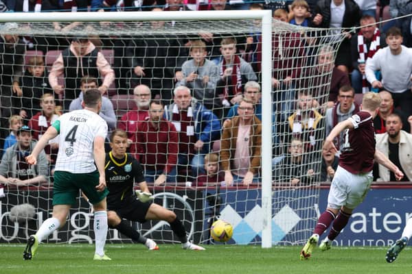 Matt Macey makes a save to deny Gary Mackay-Steven.