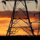 The analysts at Cornwall said they expect the price of electricity will drop to 29.55p per unit from the start of July from 33.2p today with Government support. Andrew Milligan/PA Wire