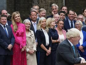 Carrie Johnson, Nadine Dorries and Rachel Johnson watch as outgoing Prime Minister Boris Johnson makes a speech outside 10 Downing Street, London, before leaving for Balmoral for an audience with Queen Elizabeth II to formally resign as Prime Minister.