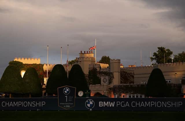 Flags are flown at half-mast on the Wentworth clubhouse following the announcement of the death of Her Majesty Queen Elizabeth II during the BMW PGA Championship. Picture: Ross Kinnaird/Getty Images.