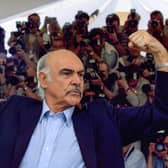 Sir Sean Connery poses for photographers during the photocall for Entrapment, at the Cannes Film Festival in 1999