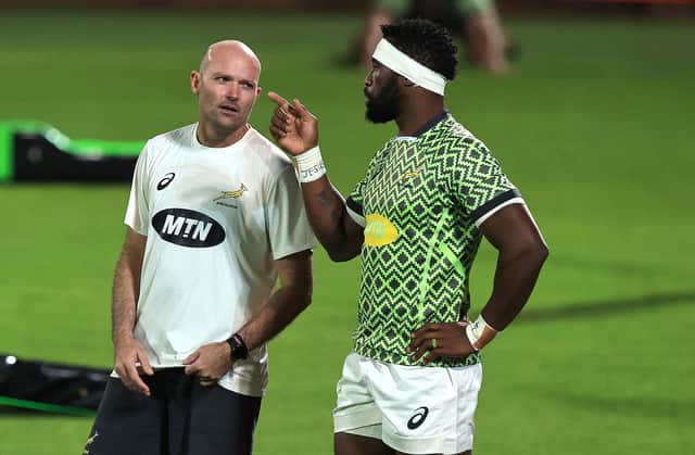 South Africa coach Jacques Nienaber talks to his captain, Siya Kolisi. Picture: David Rogers/Getty Images