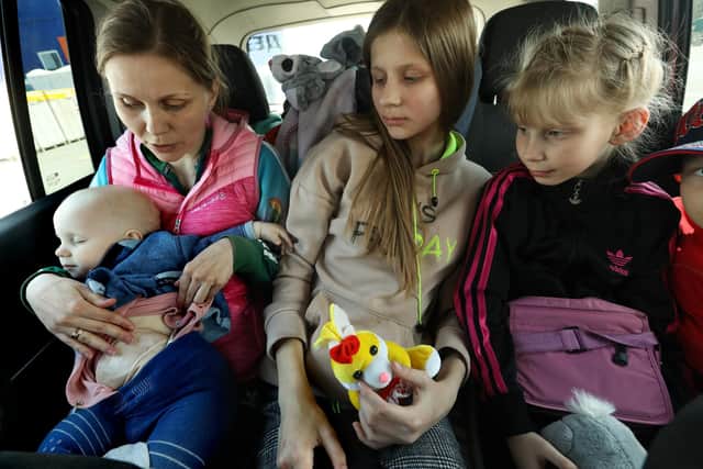 Refugees in Zaporizhzhya after leaving occupied Ukraine