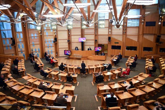 The protest took place in the Holyrood chamber. Picture: PA