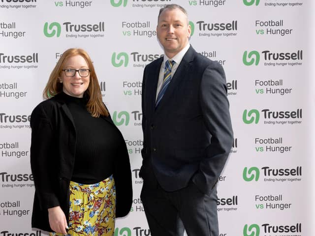 Lori Hughes from Perth and Kinross Foodbank and St Johnstone Chief Executive, Francis Smith, launch Football vs Hunger