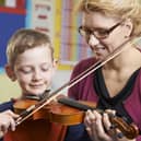 Those who had experience playing an instrument had a small but detectable association with better performance in tests . Picture: Getty