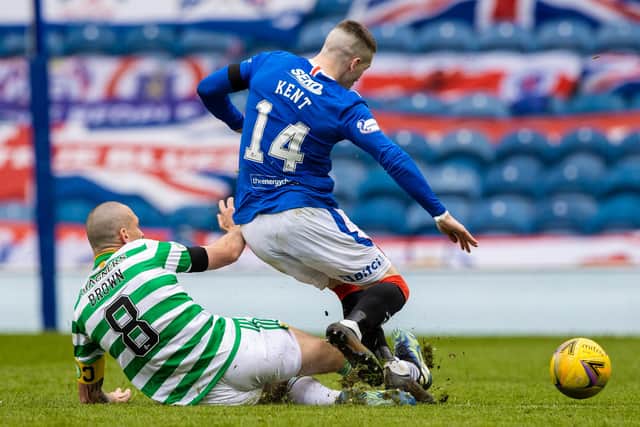 Celtic's Scott Brown with a typical full-blooded tackle on Rangers' Ryan Kent in the club's Scottish Cup tie won by the Ibrox men a fortnight ago. The English winger is one of those that he has real derby history. (Photo by Craig Williamson / SNS Group)