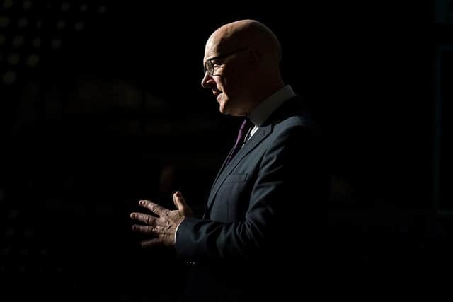First Minister John Swinney may be forced to cut proposed spending plans after a £2.1 billion black hole was forecast (Picture: Jane Barlow - Pool/Getty Images)