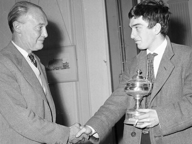 Stephen Frears receives the trophy for best university production on the 1963 Fringe on behalf of Cambridge University Theatre Company for their Barrie theatre production of Waiting for Godot.