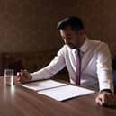 Humza Yousaf reads through his speech before heading to the stage at the SNP independence convention. Picture: Jane Barlow/PA Wire