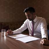 Humza Yousaf reads through his speech before heading to the stage at the SNP independence convention. Picture: Jane Barlow/PA Wire