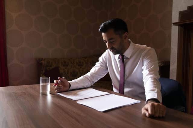 Humza Yousaf reads through his speech before heading to the stage at the SNP independence convention. Picture: Jane Barlow/PA Wire
