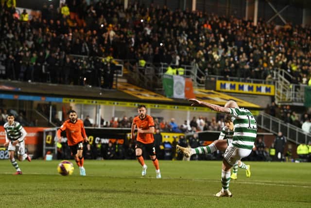 Aaron Mooy scores Celtic's second goal from the penalty spot.