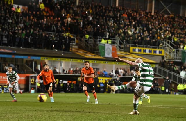 Aaron Mooy scores Celtic's second goal from the penalty spot.