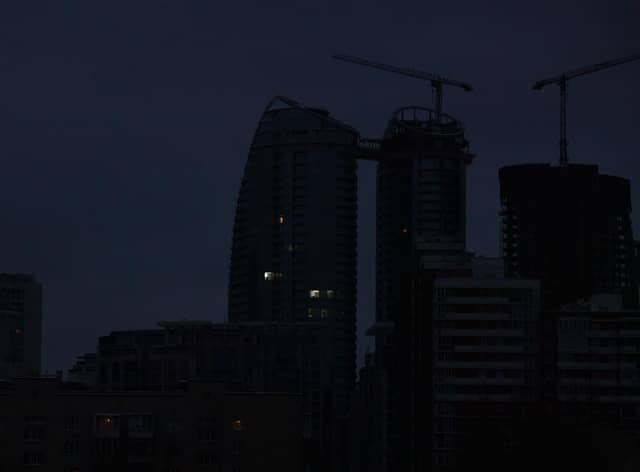 A view of Kyiv during a partial blackout in the Ukrainian capital on November 22, 2022. - The World Health Organization warned that the upcoming winter would be "life-threatening" for millions of Ukrainians after a series of devastating Russian attacks on the country's energy grid. (Photo by Sergei SUPINSKY / AFP) (Photo by SERGEI SUPINSKY/AFP via Getty Images)