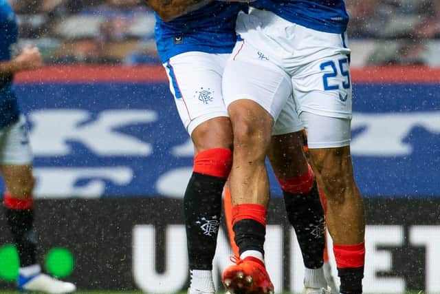 James Tavernier, left, scored and helped the Rangers defence set a new Scottish record.
