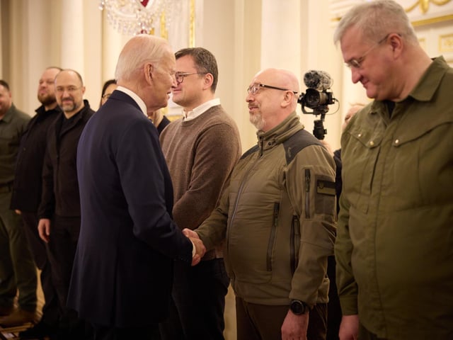 Joe Biden meeting Ukrainian military personnel as he made an unannounced visit to Kyiv, Ukraine, in a gesture of solidarity days before the one-year anniversary of Russia's invasion of the country.