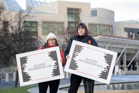 Climate campaigners use a giant house of cards outside the Scottish Parliament to warn ministers against plans to build a new fossil fuel burning power station at Peterhead. Picture: Lesley MartinSCOTTISH GOVERNMENT WARNED NEW PETERHEAD FOSSIL FUEL POWER PLANS ARE ‘HOUSE OF CARDS WAITING TO COLLAPSE’ AS COP28 BEGINSClimate campaigners today collapsed a giant house of cards outside the Scottish Parliament to warn Ministers that plans to build a new fossil fuel burning power station at Peterhead were an unsafe gamble with our climate future.  The warning comes as the First Minister is in Dubai for the UN climate conference COP28 starting today. The urgent need to phase out fossil fuels are expected to be a focus of intense discussions over the next two weeks.  All Images © Lesley Martin 2023e: lesley@lesleymartin.co.ukt: 07836745264