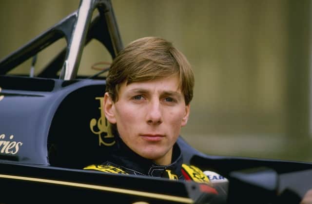Johnny Dumfries in a Lotus car in 1986