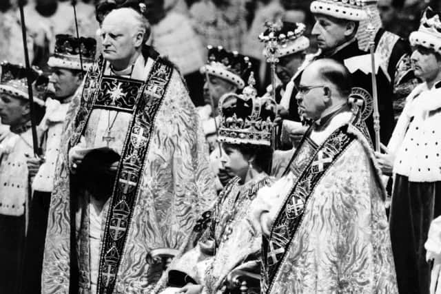 Queen Elizabeth II receives pledges of allegiance from her subjects during her coronation ceremony on June 2, 1953 (Picture: Intercontinentale/AFP via Getty Images)
