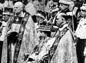 Queen Elizabeth II receives pledges of allegiance from her subjects during her coronation ceremony on June 2, 1953 (Picture: Intercontinentale/AFP via Getty Images)