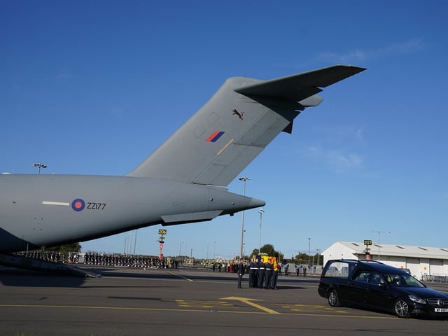 The coffin of Queen Elizabeth II at Edinburgh Airport from where it will be flown by the RAF on its journey from Edinburgh to Buckingham Palace, London, to lie at rest.