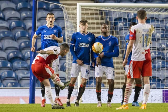 Slavia's Nicolae Stanciu makes it 2-0 with a free kick during the UEFA Europa League Round of 16 2nd Leg match between Rangers FC and Slavia Prague at Ibrox Stadium on March 18, 2021, in Glasgow, Scotland.  (Photo by Alan Harvey / SNS Group)