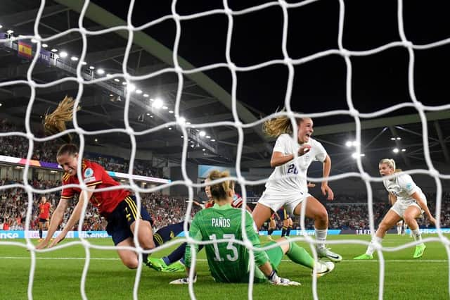 Ella Toone of England celebrates after scoring their team's first goal past Sandra Panos of Spain during the UEFA Women's Euro 2022 Quarter Final. (Photo by Mike Hewitt/Getty Images)