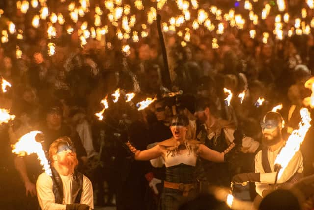 Edinburgh's Hogmanay torchlight procession brought tens of thousands of people onto the streets of the city centre. Picture: Ian Georgeson