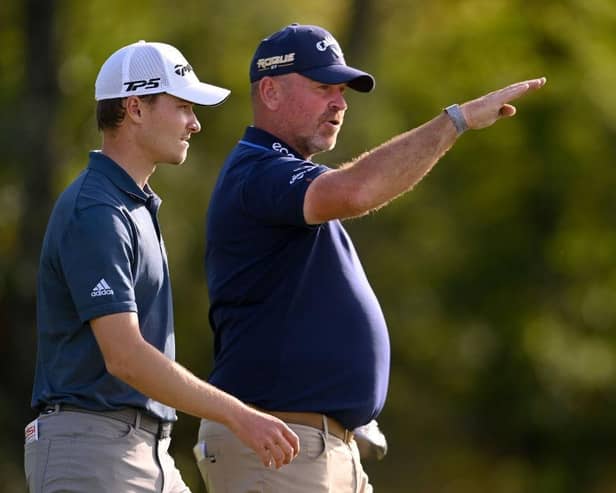 Rasmus Hojgaard listens to Thomas Bjorn during the first round of the Cazoo Open de France at Le Golf National near Paris. Picture: Ross Kinnaird/Getty Images.