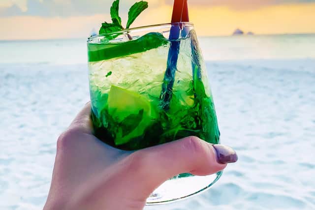 Cocktails on a sun-drenched beach, a popular dream for armchair travellers.