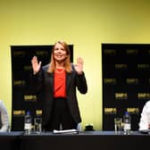 SNP leadership candidates Ash Regan, standing, Kate Forbes and Humza Yousaf at a hustings event (Picture: Andy Buchanan/pool via Getty Images)