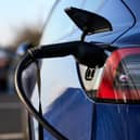 More than a fifth of new cars sold by manufacturers in the UK next year must be zero emission, rising to 80 per cent in 2030, under rules brought in by the former Conservative government.