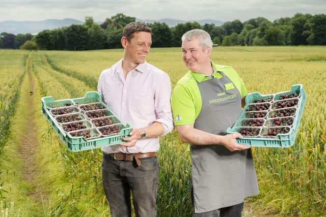Rowan Marshall, Owner & Grower at Marshall Farms and Asda Produce Colleague Martin Ferguson
