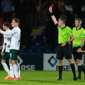 Hibs' Martin Boyle is shown a red card by referee Gavin Duncan after the final whistle following the 1-0 defeat to Ross County in Dingwall. (Photo by Ross MacDonald / SNS Group)