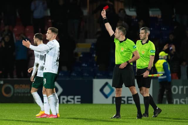 Hibs' Martin Boyle is shown a red card by referee Gavin Duncan after the final whistle following the 1-0 defeat to Ross County in Dingwall. (Photo by Ross MacDonald / SNS Group)