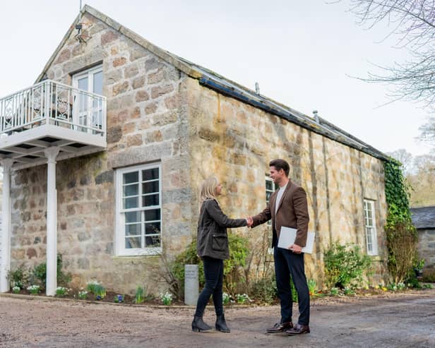 Heritage Hosting managing director, Simon Hudson, with the owner of The Ranch House Cottage (Pic:Jonathan Addie)