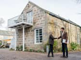 Heritage Hosting managing director, Simon Hudson, with the owner of The Ranch House Cottage (Pic:Jonathan Addie)