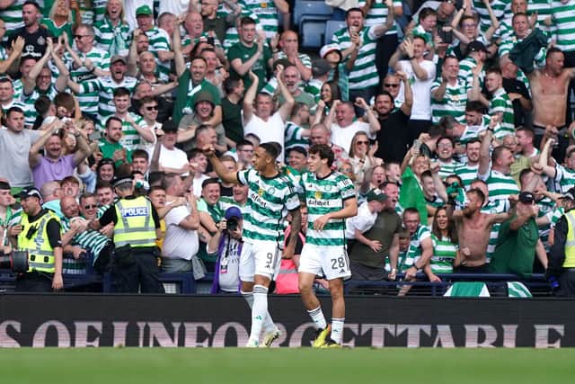 Celtic's Adam Idah (left) celebrates scoring the winner.