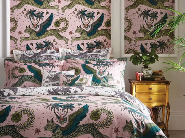 A Lynx Blush Duvet, bolstered by matching hangings