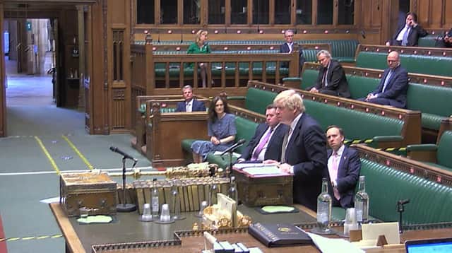 Prime Minister Boris Johnson speaks during Prime Minister's Questions in the House of Commons